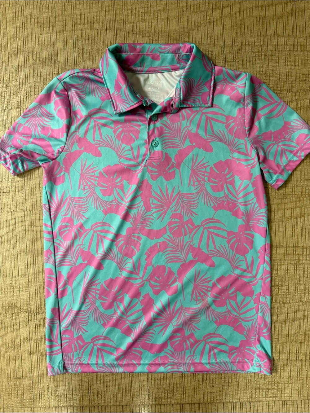 Boys Pink and Teal Floral Hawaiian golf shirt in performance blend